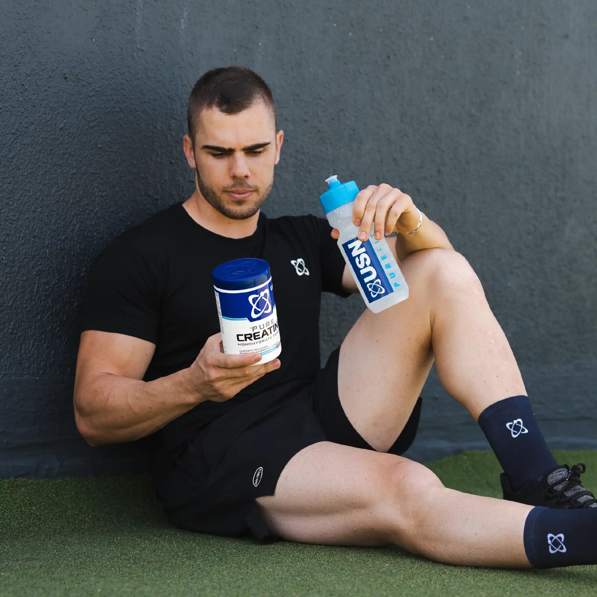 Atleta levantando pesas - USN Pure Creatine
